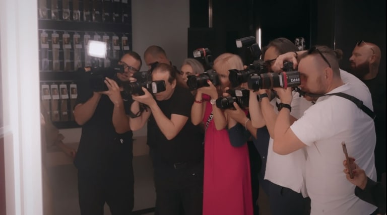 The press takes pictures of the new salon in Prague